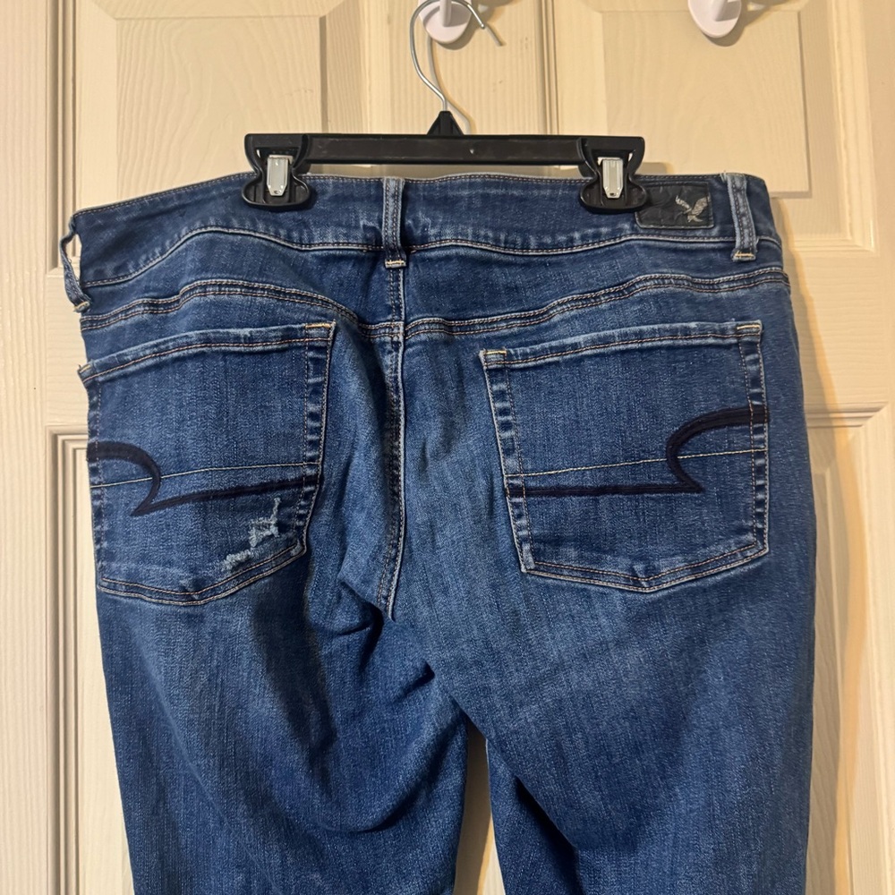 American Eagle Outfitters Blue Ripped Flare Super Stretch Jeans - Picture 7 of 11